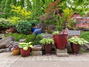 Garden Backyard Landscaping with Plants and Stone Pavers